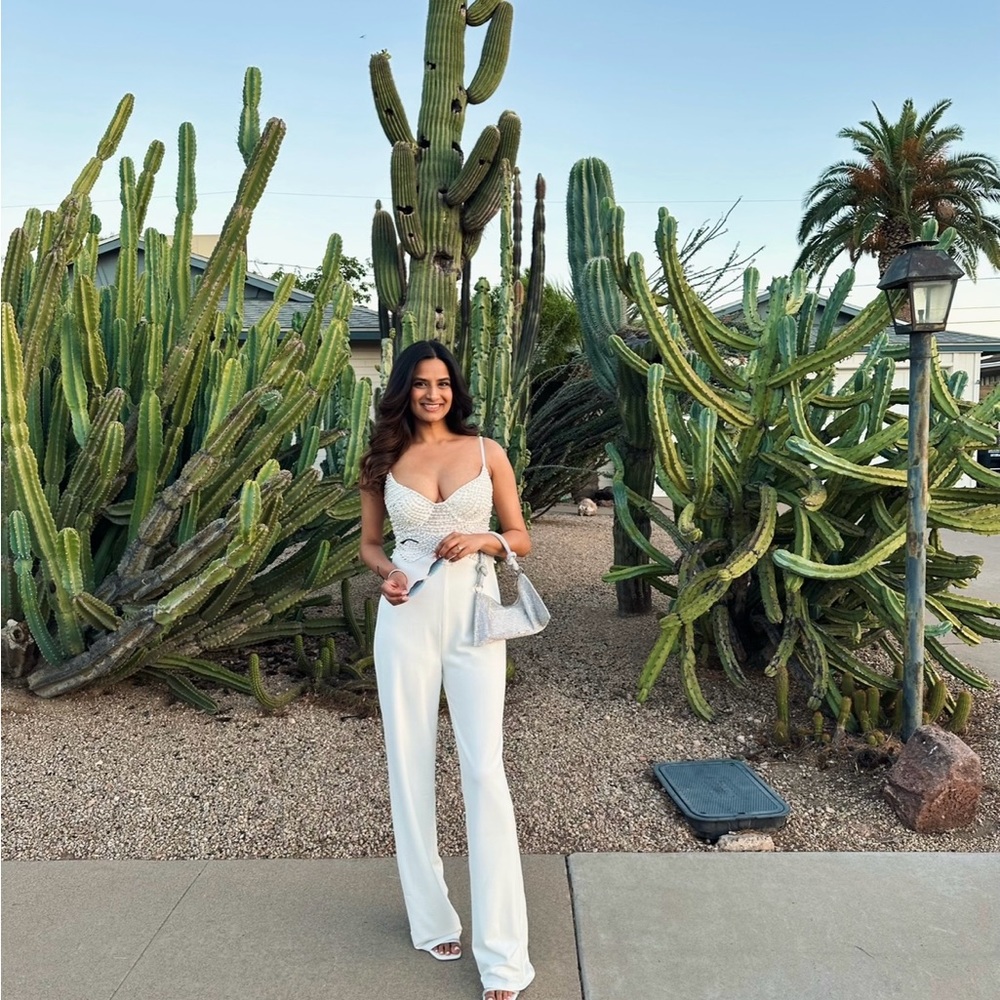 White Lulu’s jumpsuit with pearl detail